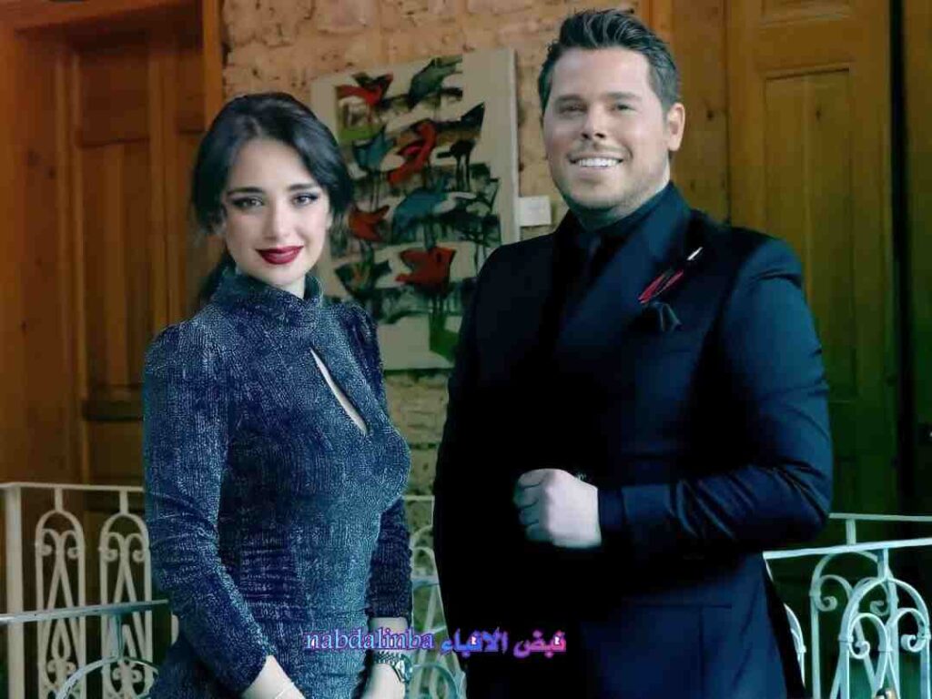 كرم حلوم وزوجته 